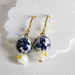 Rescued Chinese prayer clay beads turned into mordern miliminst earrings jewelry blue and white with yellow class beads.