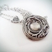 Antiqued Silver Locket with Raised Swirl detail