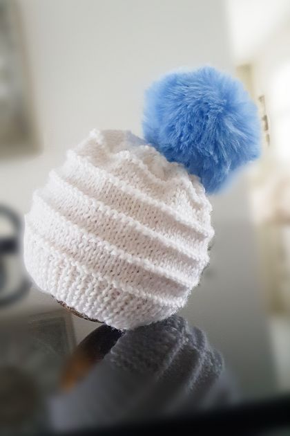 Baby Hat in 100% wool with a gorgeous faux rabbit pom pom