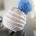Baby Hat in 100% wool with a gorgeous faux rabbit pom pom
