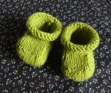 Knitted wool booties for baby