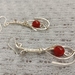 Wire wrapped sterling silver earrings with red carnelian