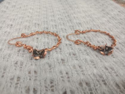 Wire wrapped hoop earrings with small flowers
