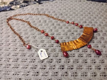 Fold formed copper necklace with pearls