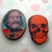 woodcut magnet duo.  Side show freak and skull.