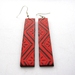 Long bright red patterned earrings
