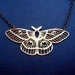 Brass moth necklace