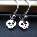teeny tiny skull earrings