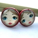 doll faces - glass dome earrings in red stud base.