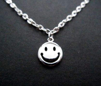 Tiny happy face necklace