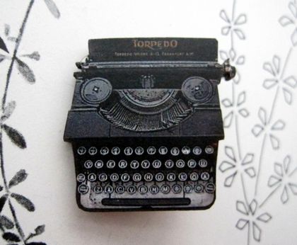 Torpedo typewriter brooch