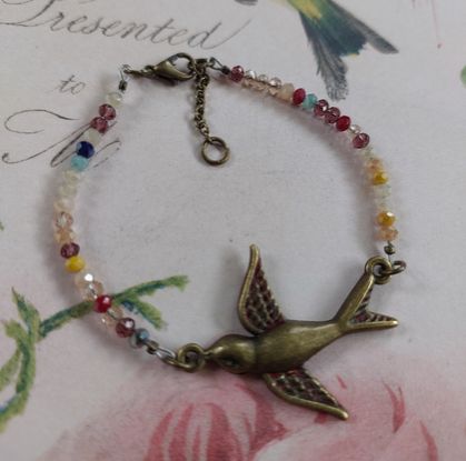 Crystal Bracelet with Antique bronze Swallow