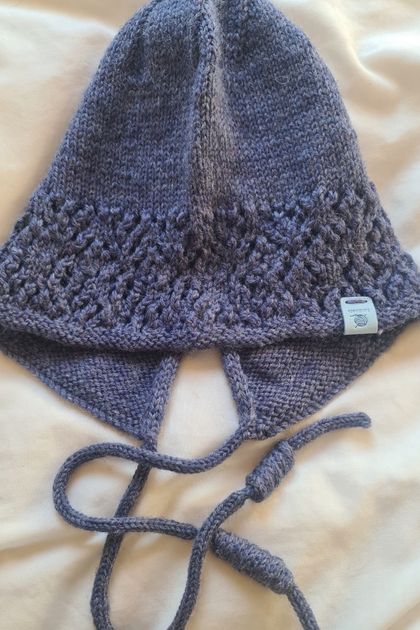 Beautiful snuggly100%wool bonnet hat. Adult size