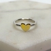 Sterling silver ring with brass heart