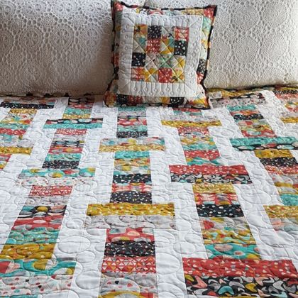 Jelly Roll Slice Quilt & cushion