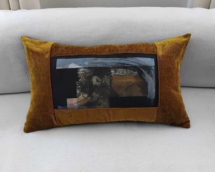 'Warmth behind the sun' rectangular cushion