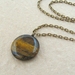 Tigris necklace: simple, semiprecious, round tiger-eye pendant on textured, antiqued-brass chain