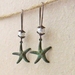 Starfish Treasure earrings in verdigris: lifelike, patinated starfish charms with white faux pearls