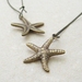 Brass Starfish earrings: lifelike, double-sided, antiqued brass starfish charms on long ear-wires