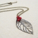 Woodland Berries: Autumnal skeleton-leaf necklace with red berry cluster