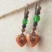 Copper Hearts earrings: vintage heart charms with bright green glass beads on long ear-wires – last pair!