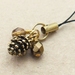 Autumn Pinecone cellphone charm with golden pinecone and sparkly brown glass beads and black strap