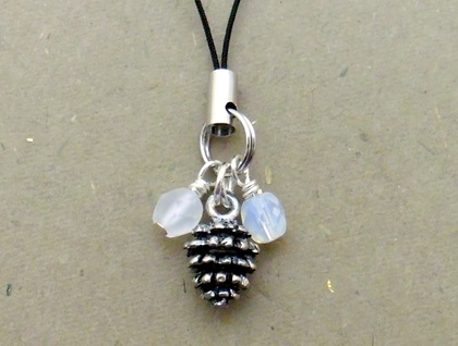 Winter Pinecone cellphone charm with silver pinecone, sparkly glass, and black strap