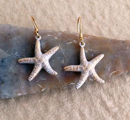 Golden Starfish earrings: lifelike starfish charms on hooks