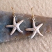 Golden Starfish earrings: lifelike starfish charms on hooks