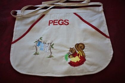 SQUIRREL COLLECTING NUTS PEG APRON