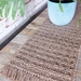 Med Handwoven, textured table runner in natural tones