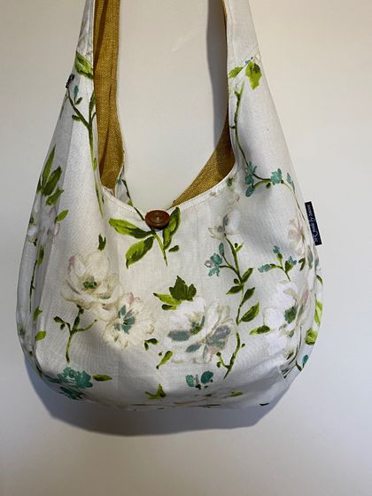 Sling bag in floral cotton 