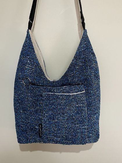 sling bag in blue tweed like fabric 