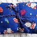 WHEAT BAG IN HELLO KITTY FABRIC, BLUE BACKGROUND