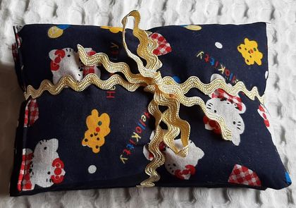 WHEAT BAG IN HELLO KITTY FABRIC, NAVY BACKGROUND