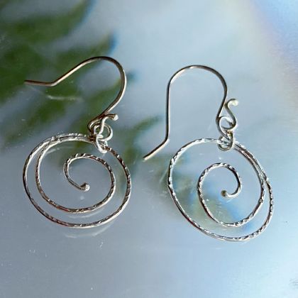 Textured sterling silver koru earrings
