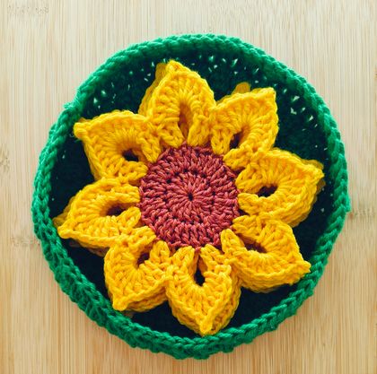 Crochet sunflower coasters with basket