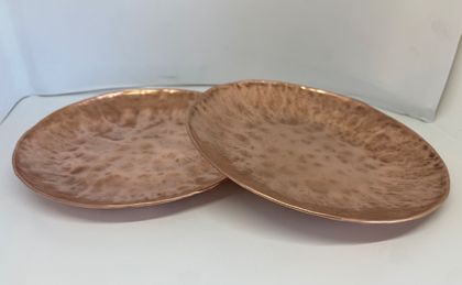 Hand beaten copper dishes