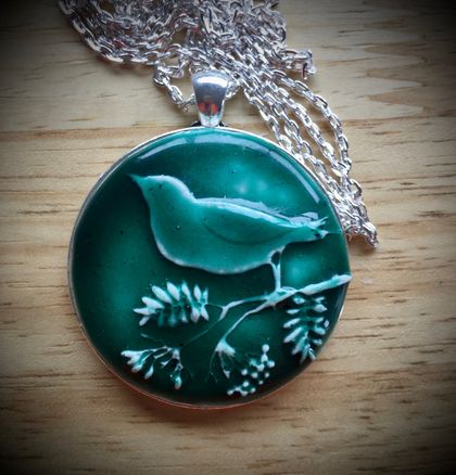 green bird pendant