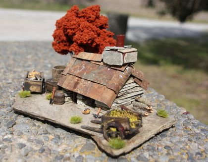 Miniature Model Stone Mining Cottage with water tank, two wheel cart plus gold cart filled with stone and artificial gold & brown tree.