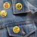 Get Pun-ny with 4 yellow 1 Inch Badges