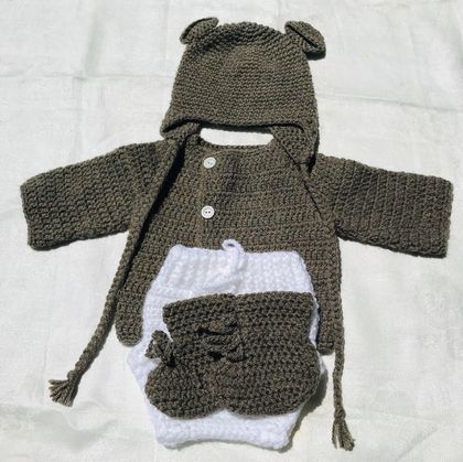 Dark brown baby outfit .