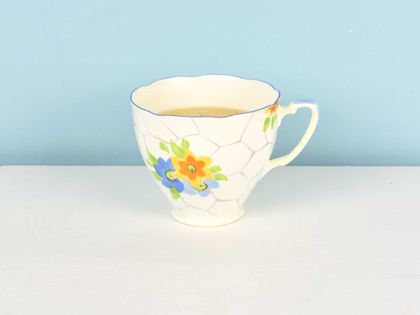 Citrus scented soy teacup candle