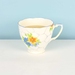 Citrus scented soy teacup candle