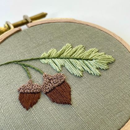 Embroidered acorns